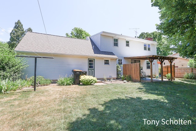 8179 Mellowwood Dr, Jenison, MI 49428 - back of property with a chimney and a pergola