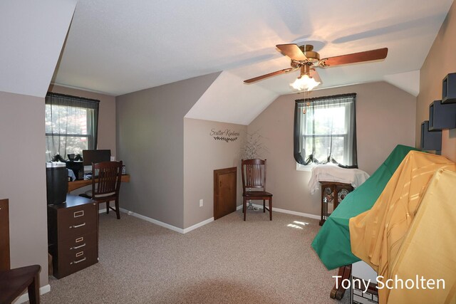 8179 Mellowwood Dr, Jenison, MI 49428 - office featuring ceiling fan, healthy amount of natural light, lofted ceiling, and carpet flooring
