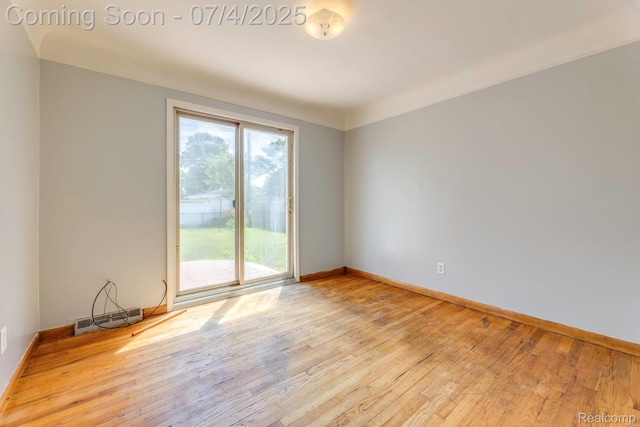 8571 Linda St, Warren, MI 48093 - spare room featuring wood-type flooring