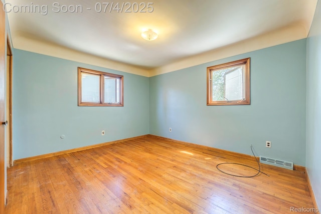 8571 Linda St, Warren, MI 48093 - unfurnished room featuring plenty of natural light and wood-type flooring
