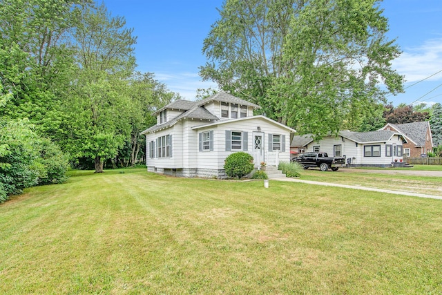 240 Stillwell Ave, Michigan Center, MI 49254 - view of front of house with a front lawn