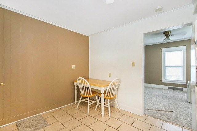 240 Stillwell Ave, Michigan Center, MI 49254 - dining area with crown molding, light tile patterned floors, and ceiling fan