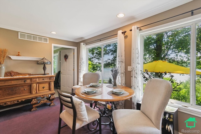 2340 Lakeview Dr, Brooklyn, MI 49230 - carpeted dining room featuring crown molding and recessed lighting
