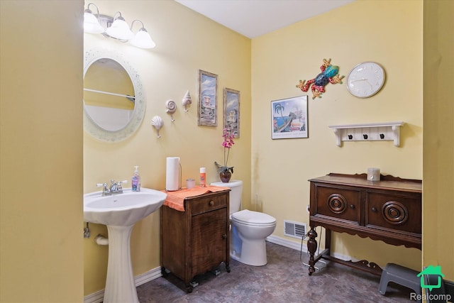 2340 Lakeview Dr, Brooklyn, MI 49230 - bathroom with toilet and baseboards