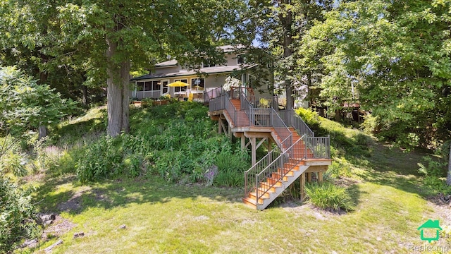 2340 Lakeview Dr, Brooklyn, MI 49230 - view of grassy yard featuring stairs