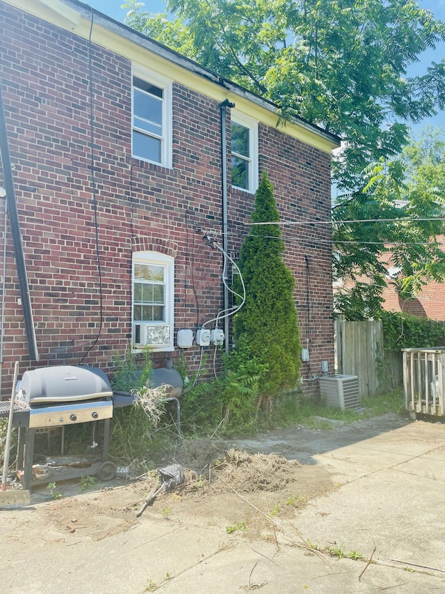 2955 Ewald Cir, Detroit, MI 48238 - view of home's exterior featuring a central air condition unit and brick siding
