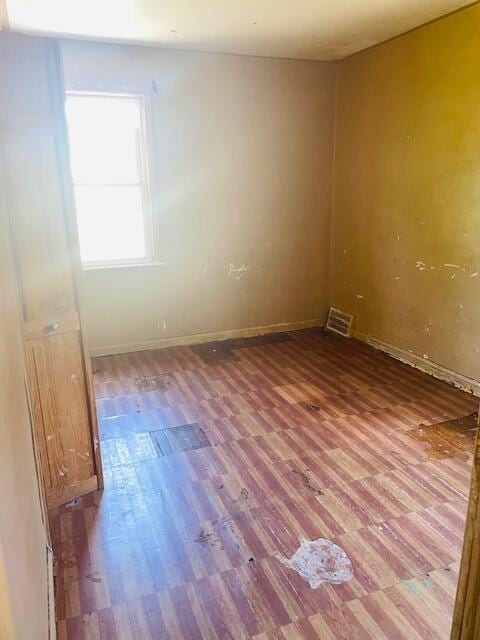 2955 Ewald Cir, Detroit, MI 48238 - spare room featuring wood finished floors and baseboards