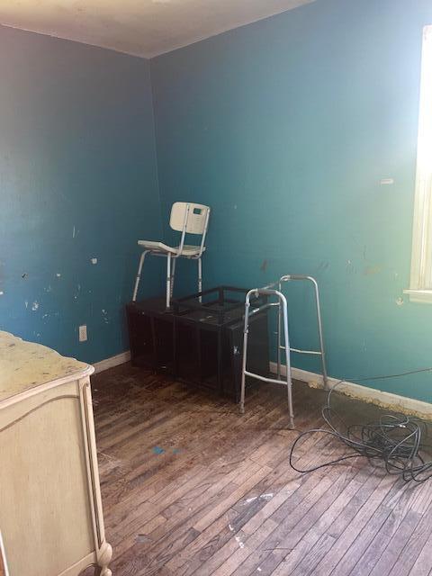 2955 Ewald Cir, Detroit, MI 48238 - bedroom with wood-type flooring and baseboards