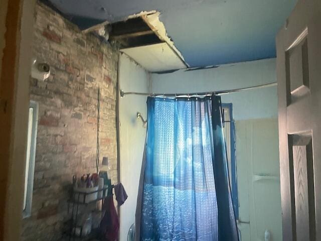 2955 Ewald Cir, Detroit, MI 48238 - miscellaneous room with brick wall