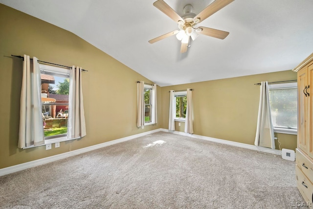 216 Budlong St, Adrian, MI 49221 - carpeted empty room with vaulted ceiling and ceiling fan