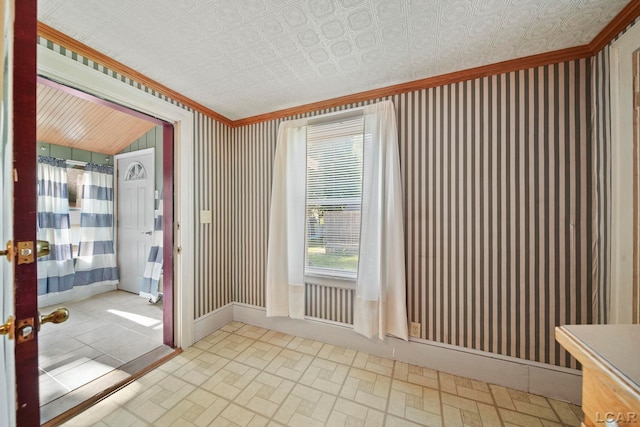 216 Budlong St, Adrian, MI 49221 - doorway to outside featuring an ornate ceiling, ornamental molding, wallpapered walls, and brick patterned flooring