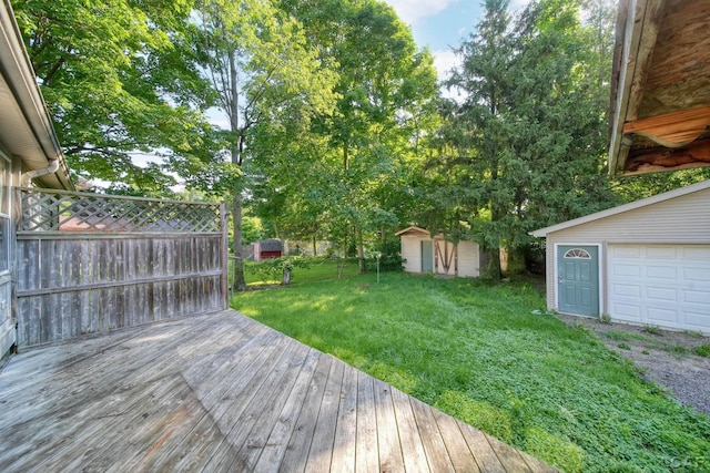 216 Budlong St, Adrian, MI 49221 - wooden terrace featuring a storage unit