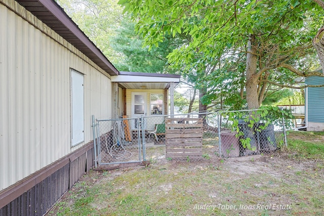 5190 N Bass Lake Rd, Irons, MI 49644 - view of yard with a gate