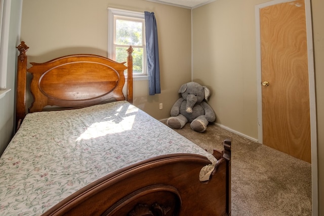 712 S Lagrave St, Paw Paw, MI 49079 - bedroom featuring carpet and baseboards