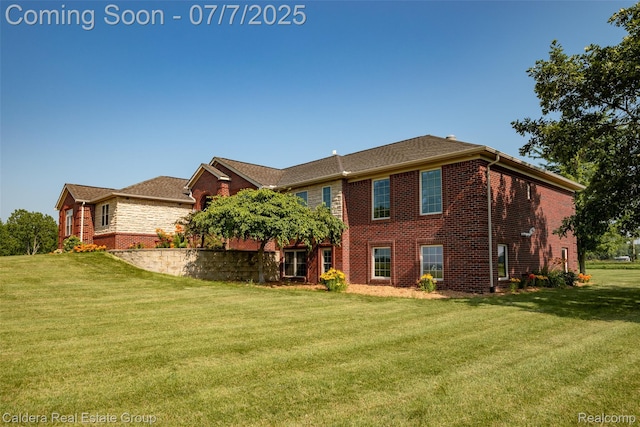 15946 Tubspring Rd, Allenton, MI 48002 - rear view of house with brick siding and a yard