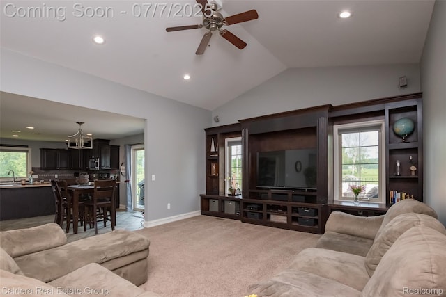 15946 Tubspring Rd, Allenton, MI 48002 - living room featuring a chandelier, recessed lighting, a ceiling fan, light carpet, and lofted ceiling