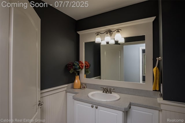 15946 Tubspring Rd, Allenton, MI 48002 - bathroom featuring vanity and a wainscoted wall