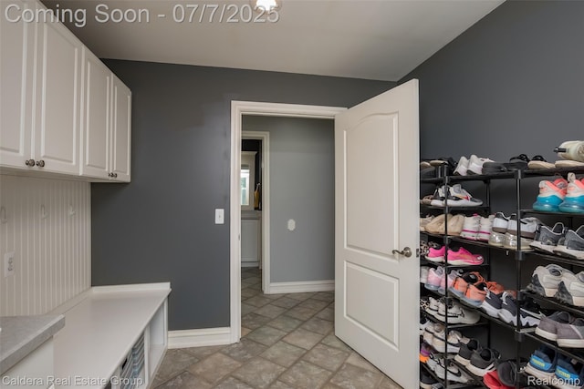 15946 Tubspring Rd, Allenton, MI 48002 - mudroom with stone finish flooring and baseboards