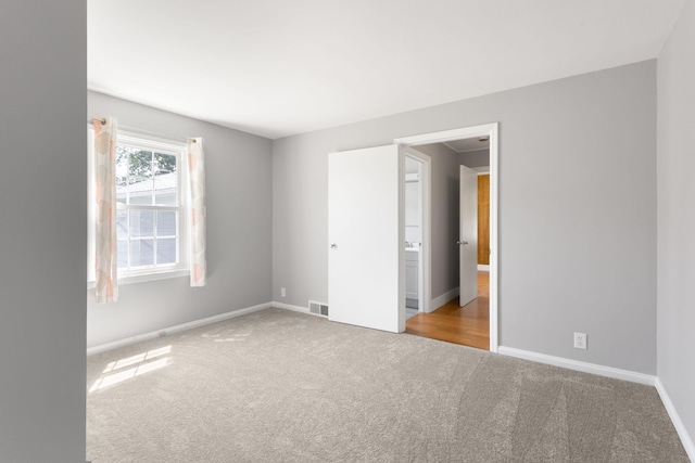 1200 Orchard Ave, Saint Joseph, MI 49085 - spare room with carpet floors and baseboards