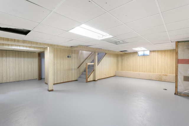 1200 Orchard Ave, Saint Joseph, MI 49085 - finished below grade area with wooden walls, stairway, and a drop ceiling