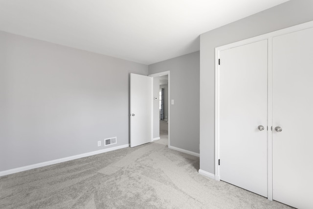 1200 Orchard Ave, Saint Joseph, MI 49085 - unfurnished bedroom with baseboards and carpet