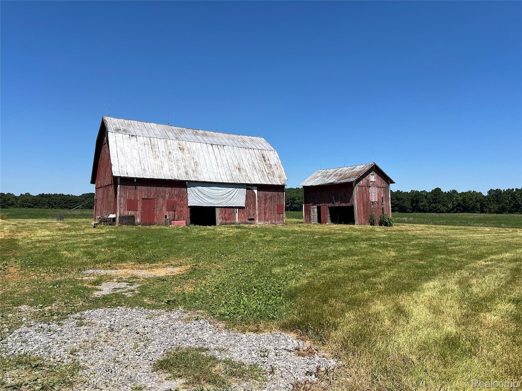 13201 N Suder Rd, La Salle, MI 48145 - view of barn featuring a yard