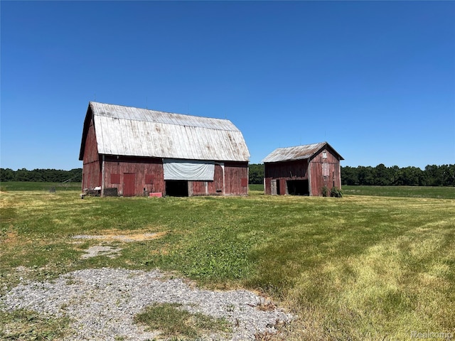 13201 N Suder Rd, La Salle, MI 48145 - view of barn featuring a yard