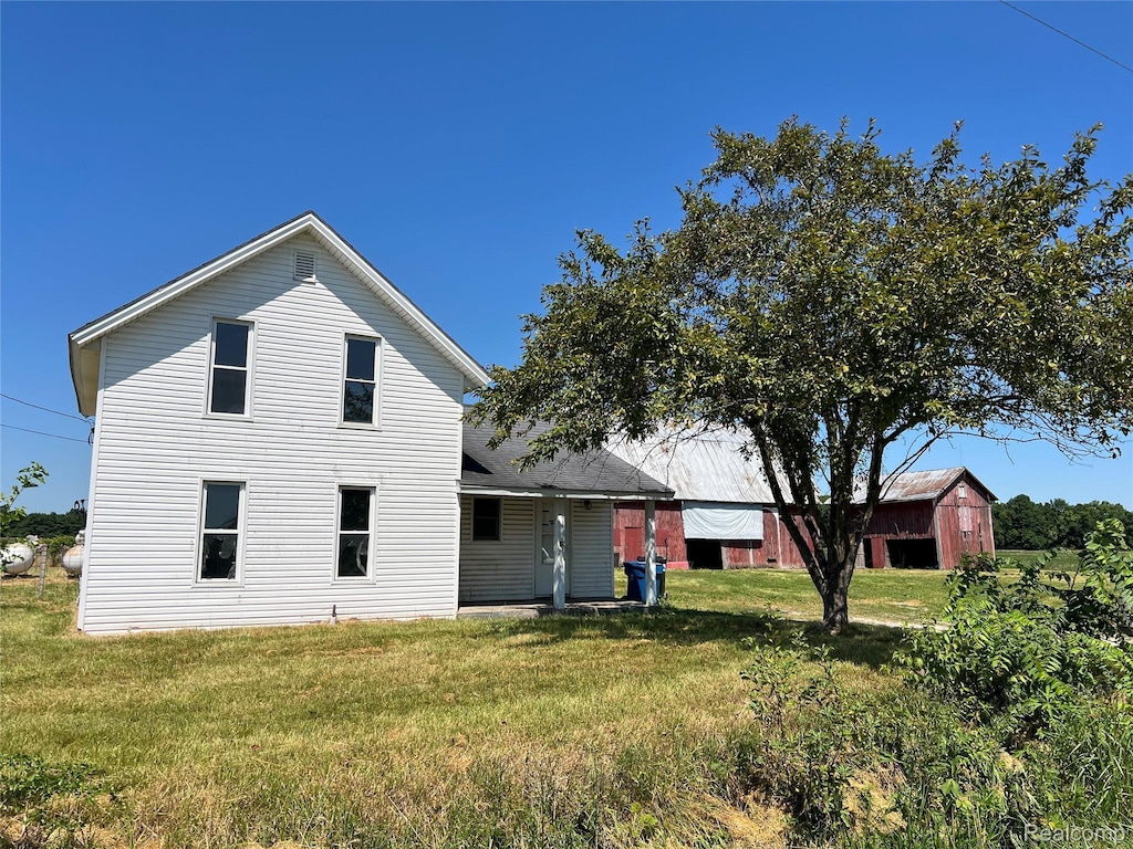13201 N Suder Rd, La Salle, MI 48145 - back of property featuring a lawn
