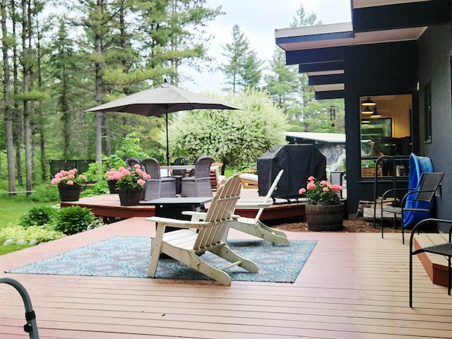 241 Dale St, Grayling, MI 49738 - wooden deck featuring grilling area