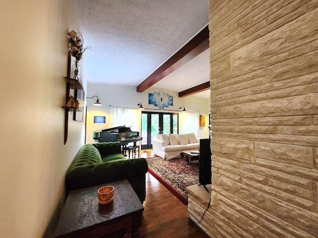 241 Dale St, Grayling, MI 49738 - living area featuring beam ceiling and wood finished floors