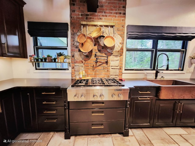 241 Dale St, Grayling, MI 49738 - kitchen with stainless steel gas stovetop and a sink