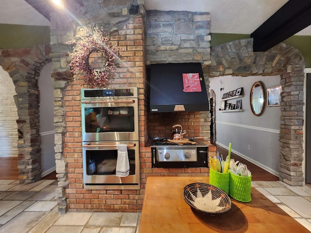 241 Dale St, Grayling, MI 49738 - kitchen featuring stainless steel double oven and extractor fan