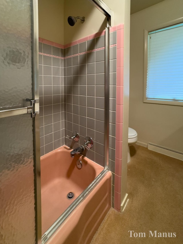 7131 Windcrest St SE, Grand Rapids, MI 49546 - bathroom with shower / bath combination with glass door and a baseboard heating unit