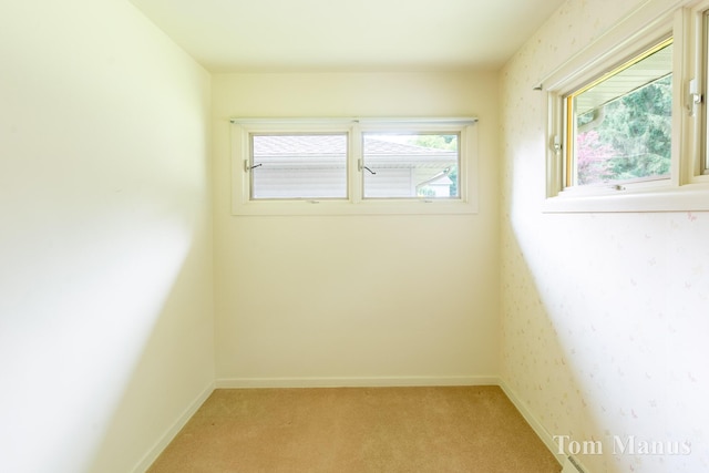 7131 Windcrest St SE, Grand Rapids, MI 49546 - unfurnished room featuring light colored carpet and baseboards