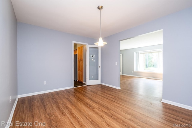 4079 Cumberland Ct, Commerce Twp, MI 48390 - spare room with wood finished floors