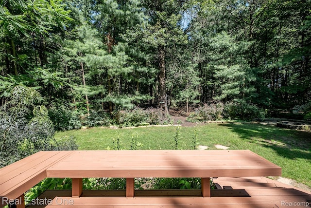 4079 Cumberland Ct, Commerce Twp, MI 48390 - wooden deck with a lawn