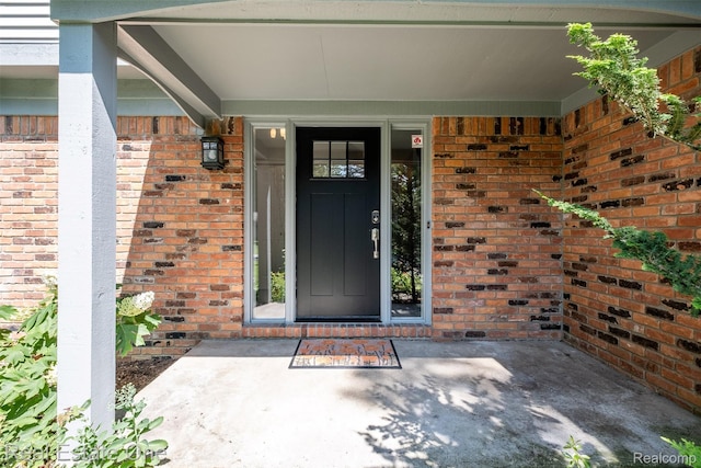 4079 Cumberland Ct, Commerce Twp, MI 48390 - property entrance with brick siding