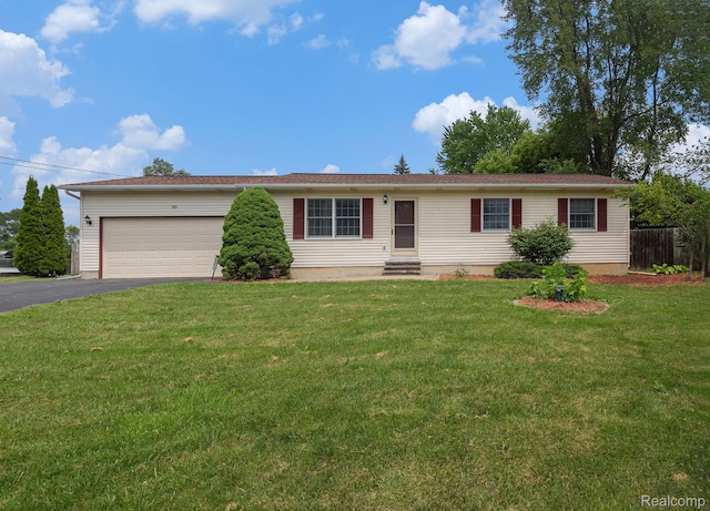 5511 Wakefield Rd, Grand Blanc, MI 48439 - ranch-style house featuring asphalt driveway, an attached garage, and entry steps