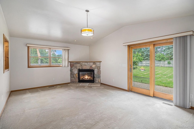 5511 Wakefield Rd, Grand Blanc, MI 48439 - unfurnished living room featuring lofted ceiling, carpet flooring, and a fireplace