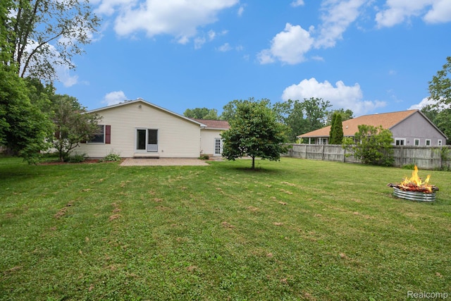 5511 Wakefield Rd, Grand Blanc, MI 48439 - view of yard with an outdoor fire pit and a patio area