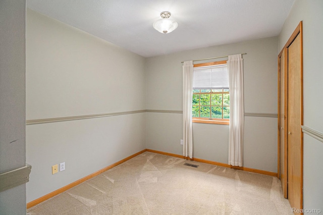 5511 Wakefield Rd, Grand Blanc, MI 48439 - unfurnished bedroom featuring baseboards and carpet floors