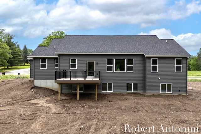 6691 Egan Ave SE, Caledonia, MI 49316 - rear view of house featuring a wooden deck and a shingled roof