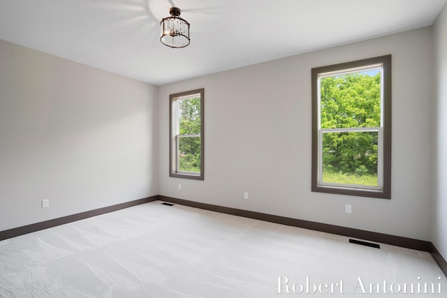 6691 Egan Ave SE, Caledonia, MI 49316 - carpeted empty room with baseboards