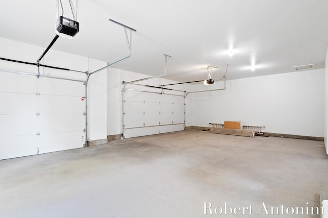 6691 Egan Ave SE, Caledonia, MI 49316 - garage with a garage door opener