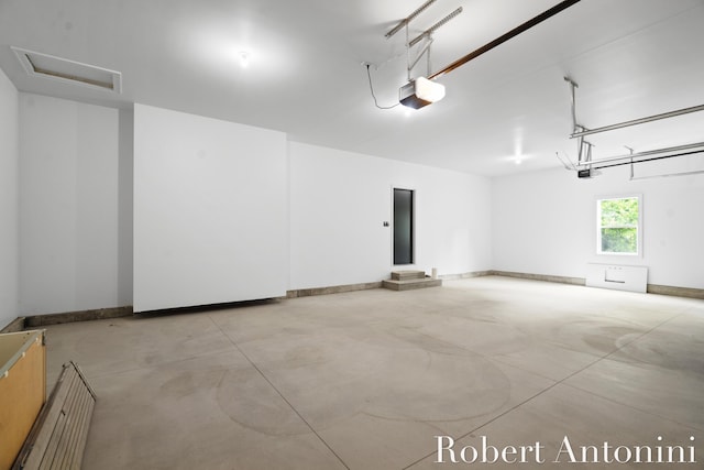 6691 Egan Ave SE, Caledonia, MI 49316 - garage with a garage door opener