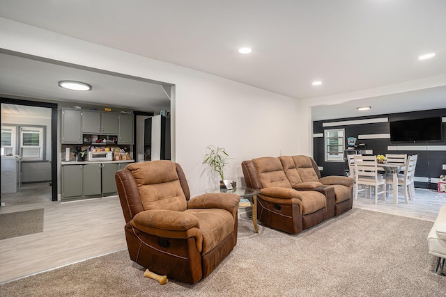 2559 Miner Ave, Muskegon, MI 49441 - living room with recessed lighting, light wood-style flooring, and bar area
