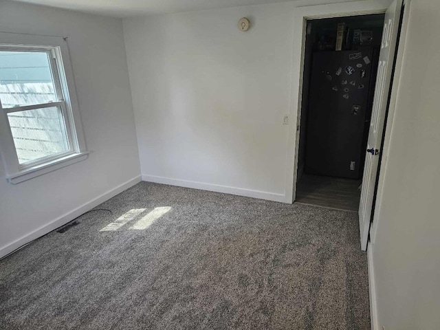 2559 Miner Ave, Muskegon, MI 49441 - carpeted spare room featuring baseboards