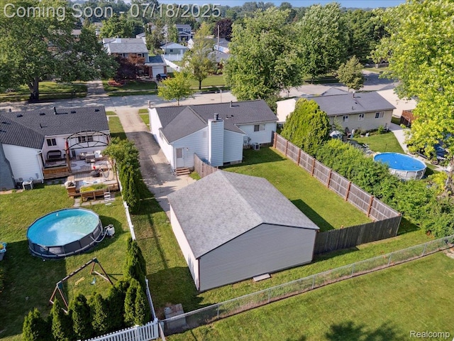321 Harvard Ave, South Lyon, MI 48178 - aerial view of residential area featuring a pool