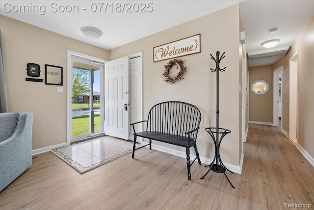 321 Harvard Ave, South Lyon, MI 48178 - foyer featuring wood finished floors