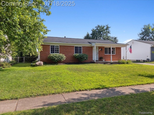 321 Harvard Ave, South Lyon, MI 48178 - single story home featuring brick siding